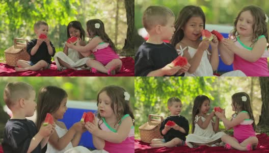 三个孩子一起吃水果高清在线视频素材下载