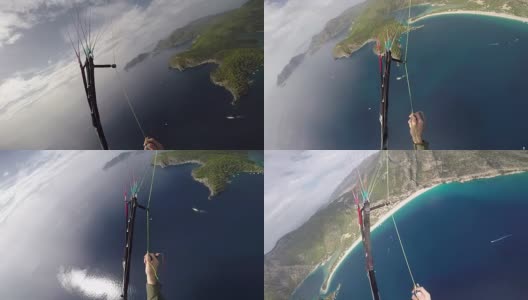 在地中海上空飞行的滑翔伞高清在线视频素材下载