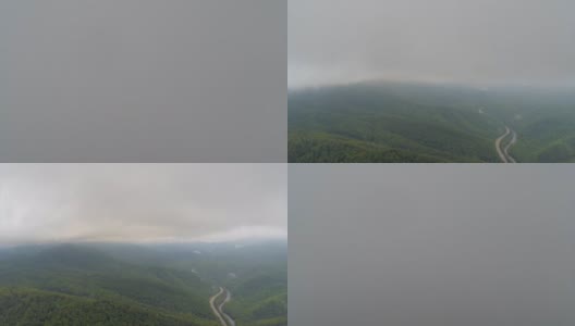 从云层下降到森林景观高清在线视频素材下载