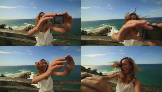 一个年轻女人在悬崖上的自画像，夏天高清在线视频素材下载