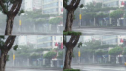 模糊散焦的极端风和雨在台北街头的一个超级台风高清在线视频素材下载