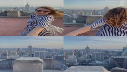 夫妇在屋顶上。曼哈顿摩天大楼甲板上的女孩手牵手高清在线视频素材下载