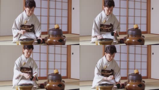 日本茶师正在准备制作一杯传统抹茶高清在线视频素材下载
