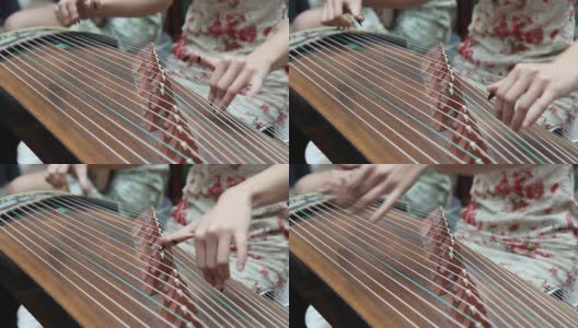 弹奏古筝的中国女孩高清在线视频素材下载