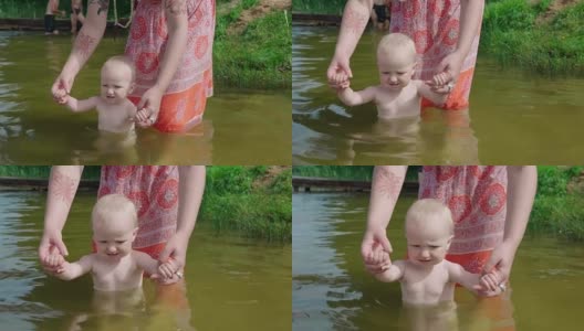 妈妈在池塘里给婴儿洗澡高清在线视频素材下载