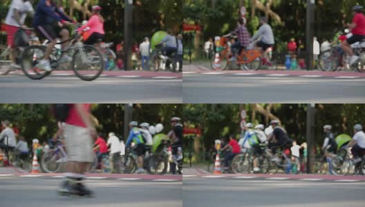 在大城市的大街上成群的人骑自行车高清在线视频素材下载