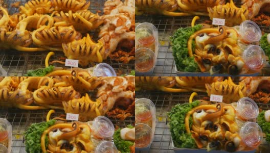 国家亚洲异国情调准备吃海鲜在夜间街头市场美食广场在泰国。美味的烤虾或虾和其他小吃。高清在线视频素材下载