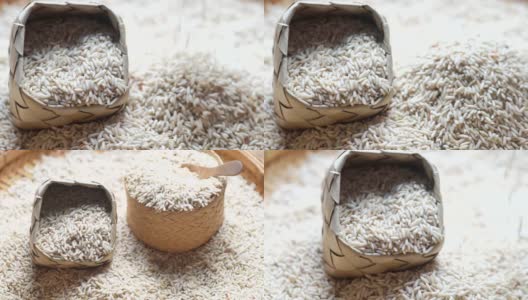 2 .在CU Dolly右拍摄棕叶篮子里的糙米，并将其倒在大米的背景上。高清在线视频素材下载