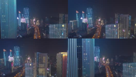 飞行飞越青岛市区，夜间照明显示4k中国交通街道航拍全景图高清在线视频素材下载