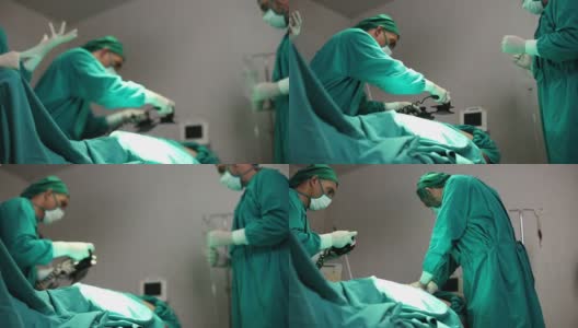 医生正在帮助病人用机器除颤。高清在线视频素材下载