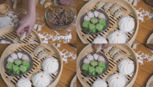 亚洲女人包饺子、饺子是中国传统食物的概念。高清在线视频素材下载