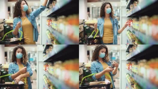 一名年轻女子在新冠肺炎疫情期间重新开业后去杂货店购物高清在线视频素材下载