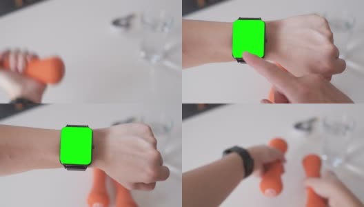 手戴绿屏智能手表，手持哑铃在家锻炼高清在线视频素材下载