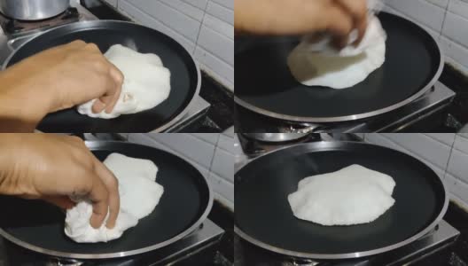 烹饪食物项目(Appam)在不粘塔瓦近距离视图高清在线视频素材下载