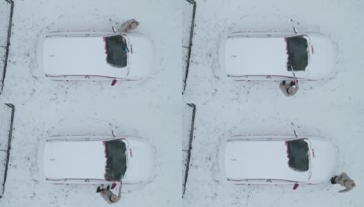 清理雪车挡风玻璃上的冰高清在线视频素材下载