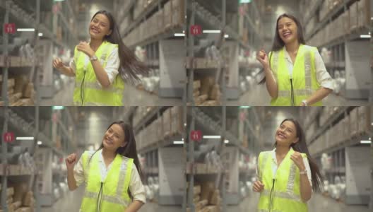 有趣的女仓库工人在仓库跳舞，在休息时享受慢动作高清在线视频素材下载