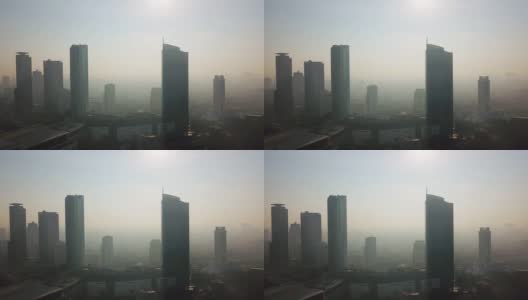 在雾天，古宁安CBD周围的摩天大楼高清在线视频素材下载