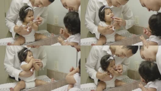 爸爸在给宝宝刷牙高清在线视频素材下载