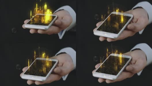 商人拿着电话与3D城市全息图高清在线视频素材下载