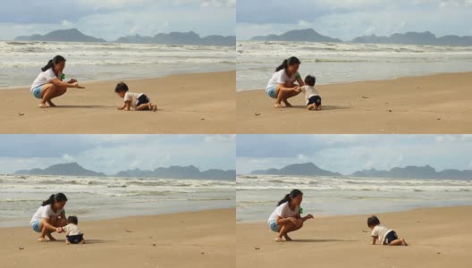 婴儿在海滩上爬高清在线视频素材下载