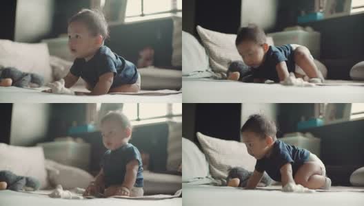 一个6-11个月大的男婴独自坐着高清在线视频素材下载