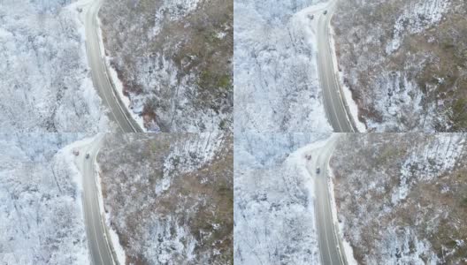 在偏远的积雪道路上，需要帮助的汽车司机高清在线视频素材下载