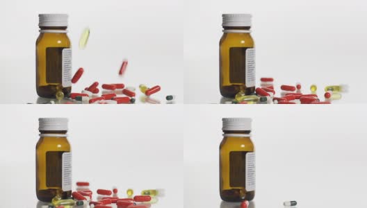高清慢镜头:药物倒在药瓶上高清在线视频素材下载
