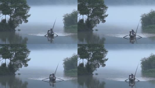 小渔船在雾天宁静的湖面上高清在线视频素材下载