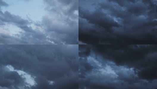 乌云笼罩着黑色的暴风雨般的天空。在雷暴天气，巨大的暴风雨雨云在天空中快速移动。史诗cloudscape高清在线视频素材下载