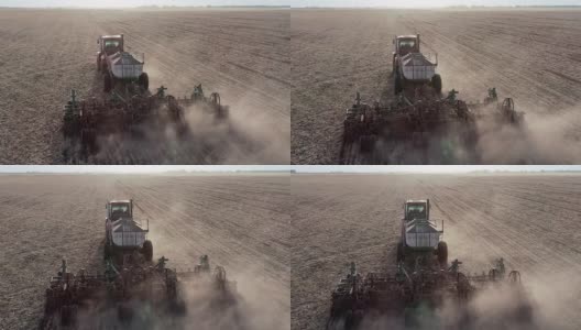 工业农场的鸟瞰图，在农田上工作，用工业机器耕作高清在线视频素材下载