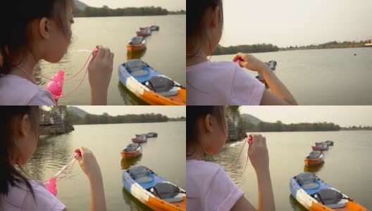 亚洲小女孩吹肥皂泡高清在线视频素材下载