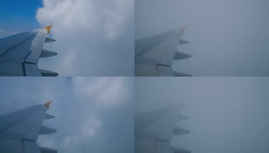 飞机机翼穿过云层高清在线视频素材下载