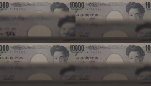 自动取款机里有1000日元的钞票。日本的点钞视频。高清在线视频素材下载