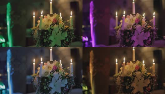 Table decoration with candles and flowers高清在线视频素材下载
