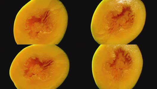 芒果热带水果健康摘要与黑色背景高清在线视频素材下载