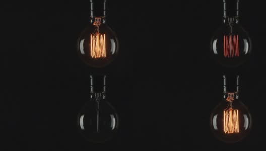 黑色背景上的灯泡-概念概念高清在线视频素材下载