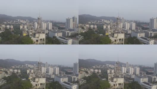 现代城市背景下的5G信号塔高清在线视频素材下载