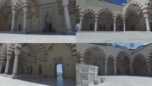4k长镜头框架拍摄场景巨大的伊斯兰清真寺-长镜头清真寺的花园-现代和传统的伊斯兰建筑寺庙-清真寺内包括近距离的尖塔和圆顶-适合斋月和eid高清在线视频素材下载