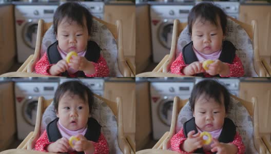 亚洲小女孩第一次吃手抓食物高清在线视频素材下载