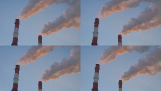 工厂的大烟囱排放出的烟雾对天空造成了环境污染高清在线视频素材下载