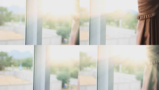高清摄影车:晨光透过窗帘照在阳台上。高清在线视频素材下载