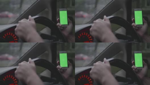 在车上用智能手机，绿色屏幕高清在线视频素材下载