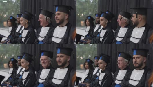 在毕业典礼上微笑的大学生们高清在线视频素材下载