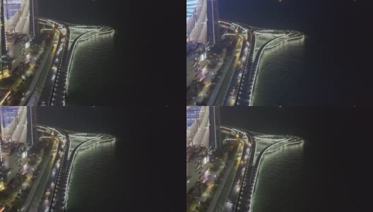 海上高速公路交通流量在夜间的城市高清在线视频素材下载
