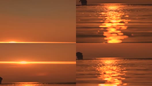 向下倾斜拍摄在海滩上的夕阳反射高清在线视频素材下载