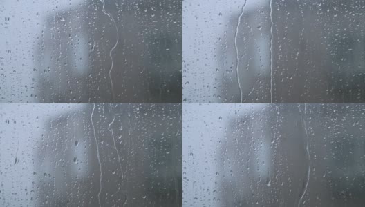 雨水滴在窗户玻璃上高清在线视频素材下载