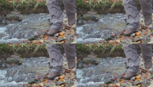 一个男人走在小溪边的电影摄影高清在线视频素材下载