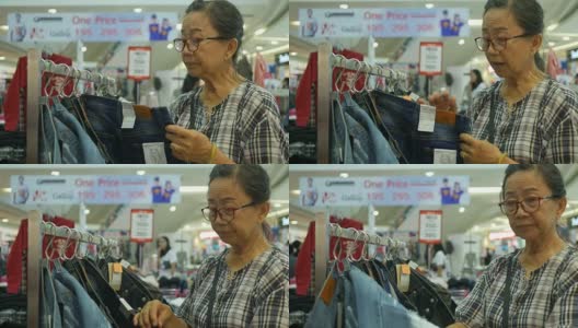 亚洲老年女性在购物中心购物高清在线视频素材下载