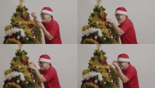 装饰我的圣诞树一定很有趣。高清在线视频素材下载