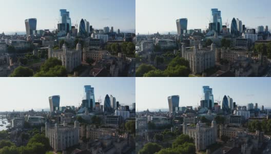 鸟瞰图中世纪的石头保持与四个塔在角落。伦敦塔与市中心的现代摩天大楼签约。英国伦敦高清在线视频素材下载